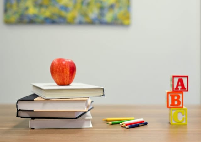 School books and practice materials on a desk